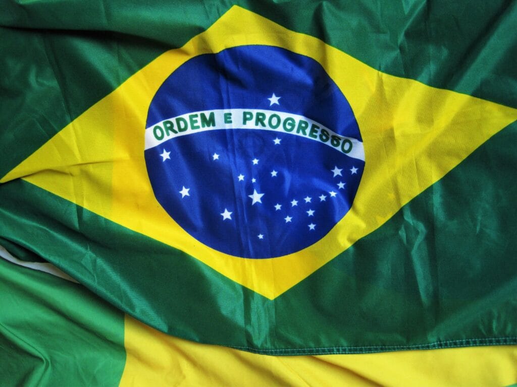 assy-brazilian-flag-1420482-1024x768 Deepfakes Políticos: Como a IA Está Transformando as Eleições em 2026